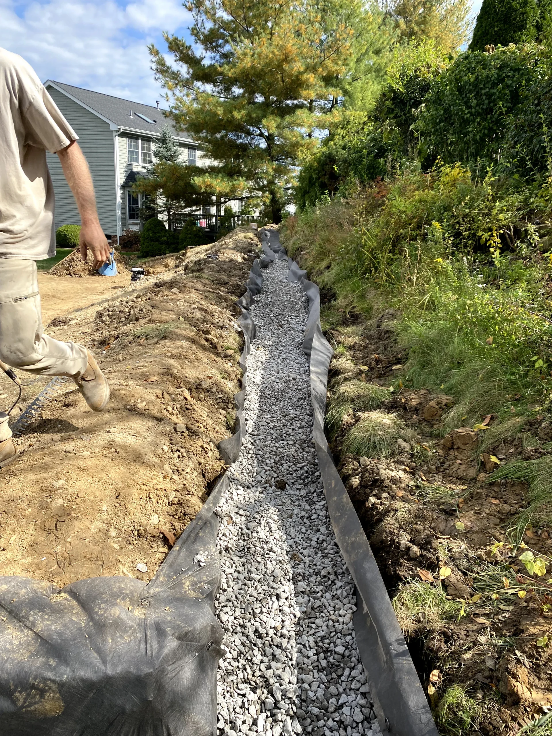 French Drain Installation Rock Base