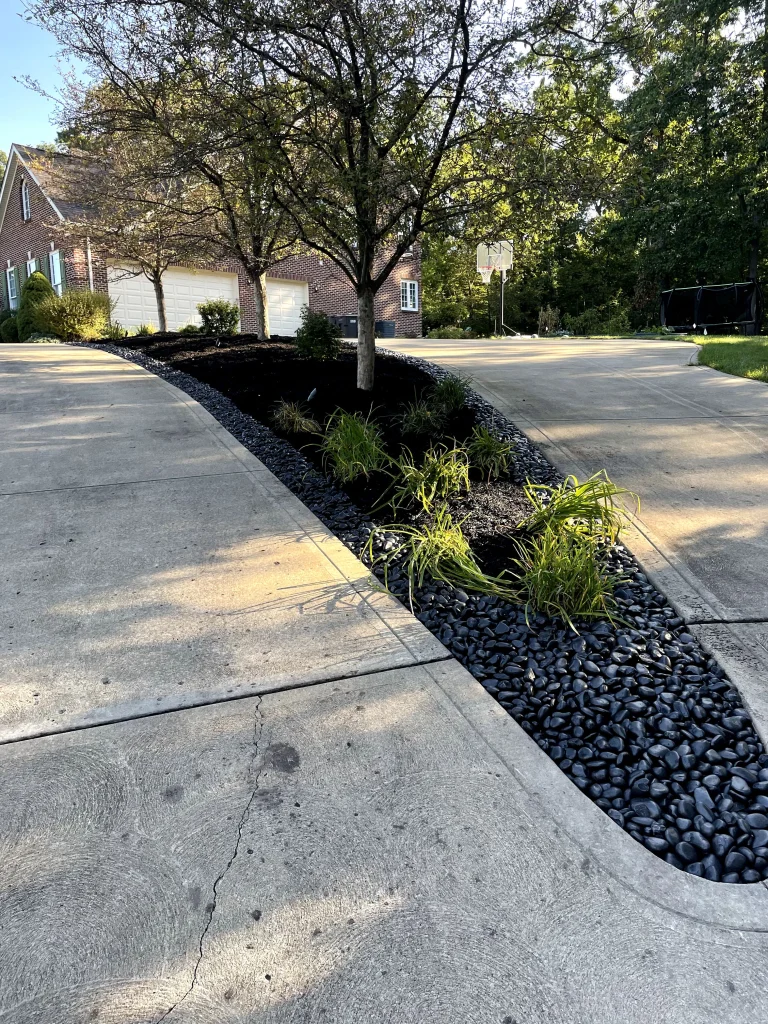Rock and Mulch Bed Installation Between Driveways