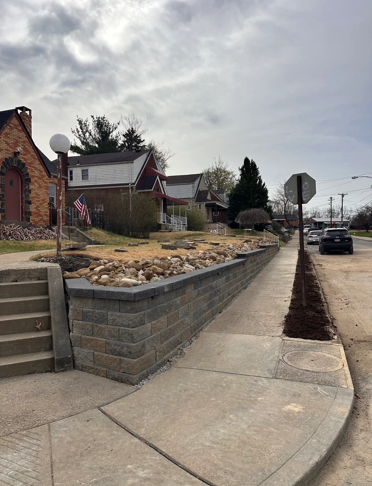 Long Retaining Wall Along Sidewalk