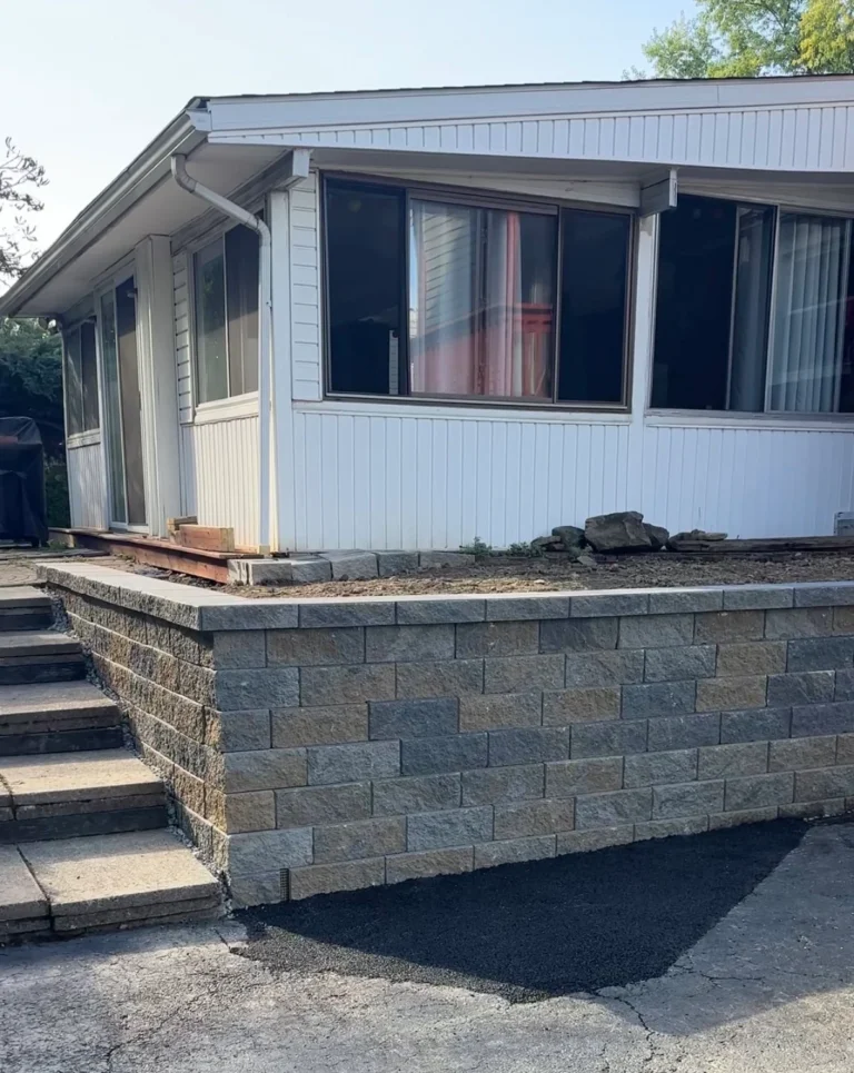 Retaining Wall With Steps Leading To Home